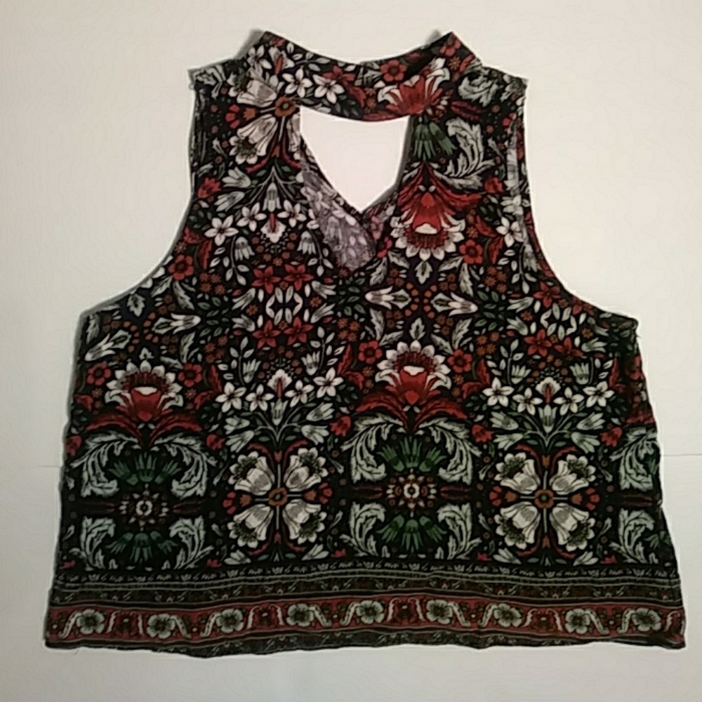 Floral sleeveless blouse with triangle cut outs
